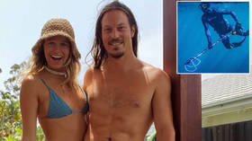 'We've lost a special soul': World snowboarding champ drowns in freak shallow water blackout while spearfishing in Australia