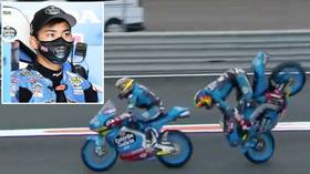 Head over heels: Teammates collide in SPECTACULAR practice crash at European MotoGP (VIDEO)