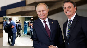 Bolsonaro greets jailed driver of ex-Spartak Moscow star Fernando with hug at Rio airport after thanking Putin for release (VIDEO)