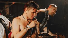 Russian rock star accused of LGBT propaganda for performing in a sock