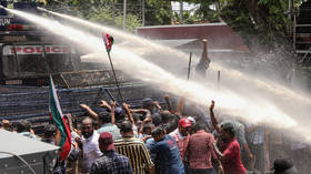 Fifteen Indians handed death sentences over political killing